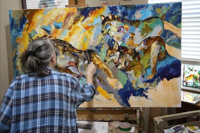 Artist at work...Commissioned painting 40 x 60 inches of wolves and thick buttery Holbein Duo Oil. I have used them since 1997.